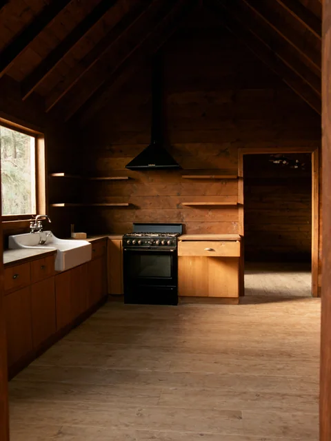 Cleared timber kitchen with bare counters